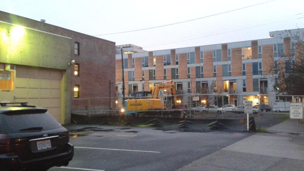 Central Eastside Lofts pictured in the background. Photo credit: Portland Chronicle